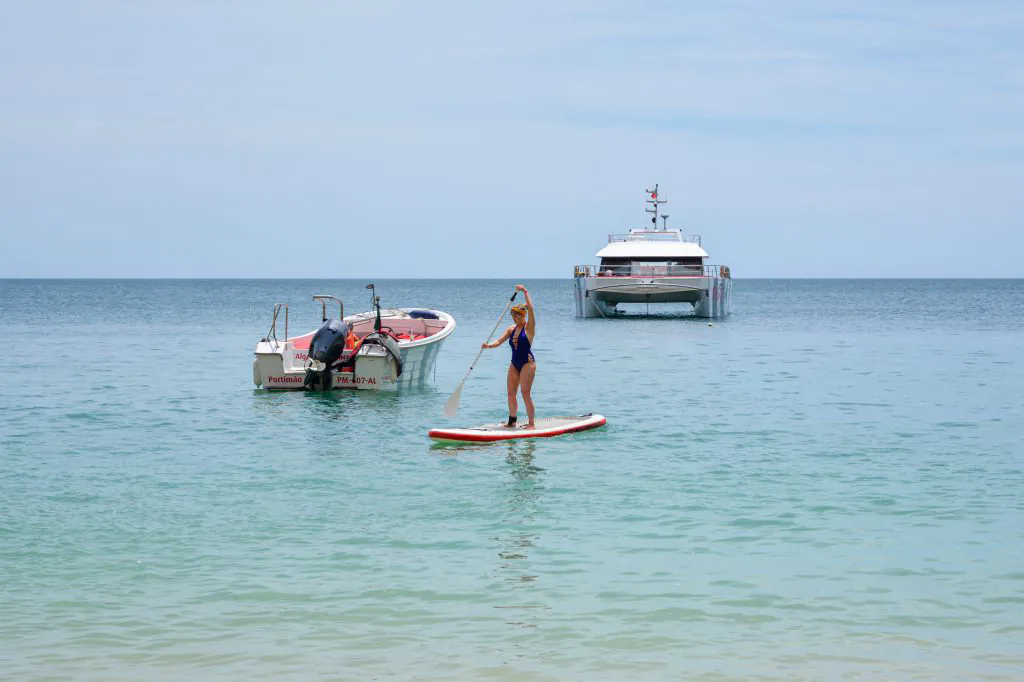 standup paddle close to the beach barbecue algarexperience