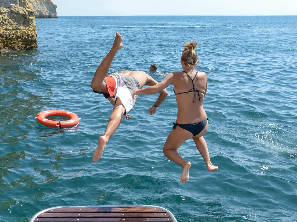 swimming stop boat trip algarexperience